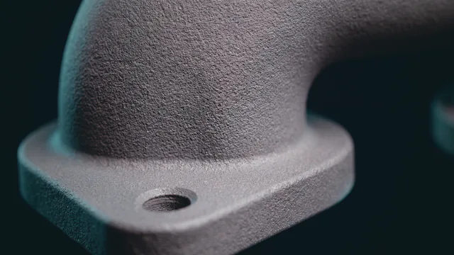 Close-up render of a manifold runner and mounting pad as printed, grainy gray.