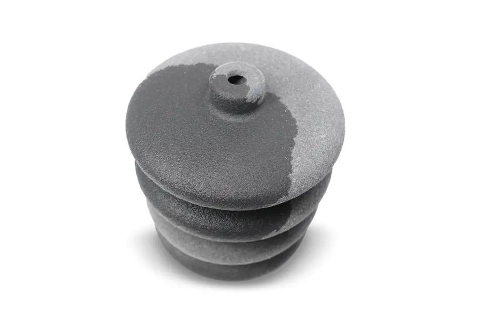 TPU bellows as printed, with a rough gray surface