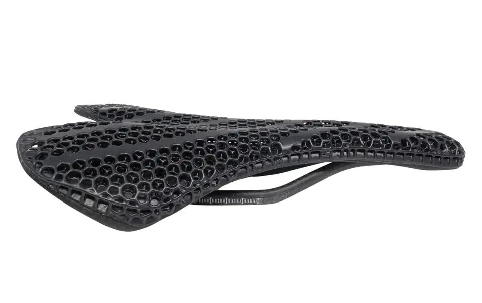 The same saddle after PostPro vapor smoothing, with a smooth, sealed black surface
