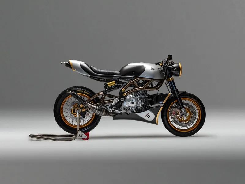 Langen Two Stroke motorcycle in side view on a gray studio background