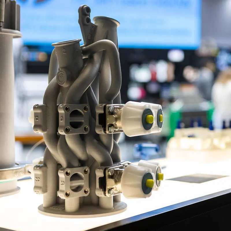 3D-printed ice cream extruder manifold on an exhibition stand